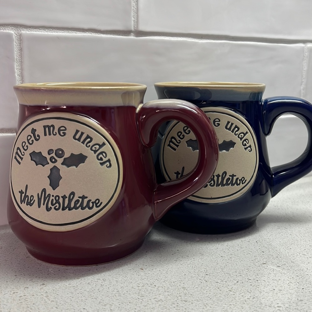 Two hand crafted Meet me Under the Mistletoe mugs
